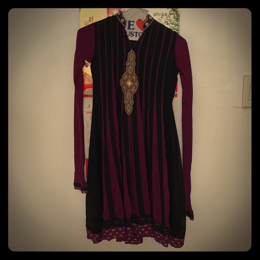 This is a vintage dress is black and lavender